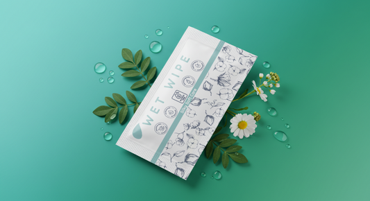 Custom branded wet wipes placed on a restaurant table to improve customer experience and hygiene